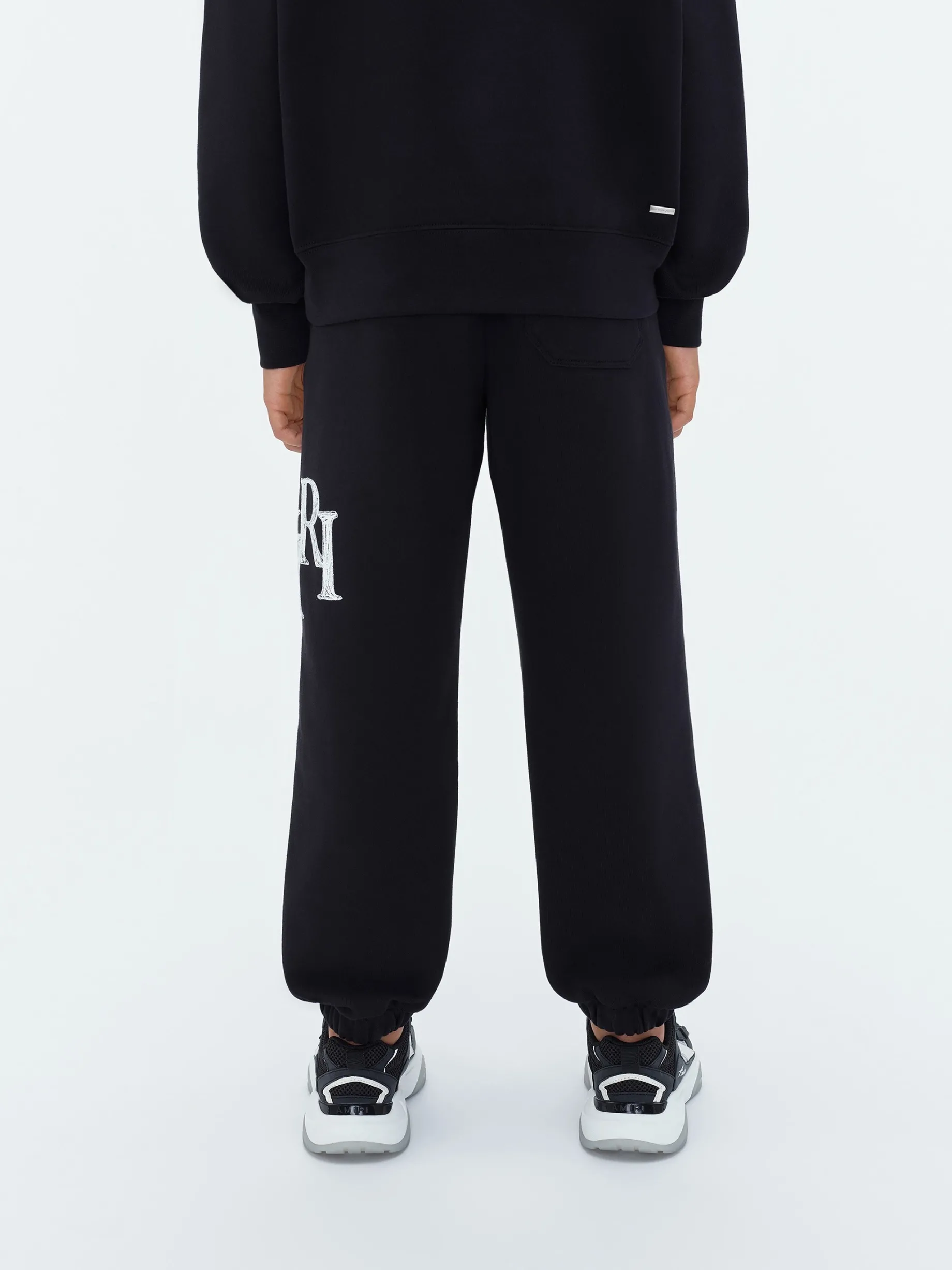 AMIRI STAGGERED SCRIBBLE SWEATPANT