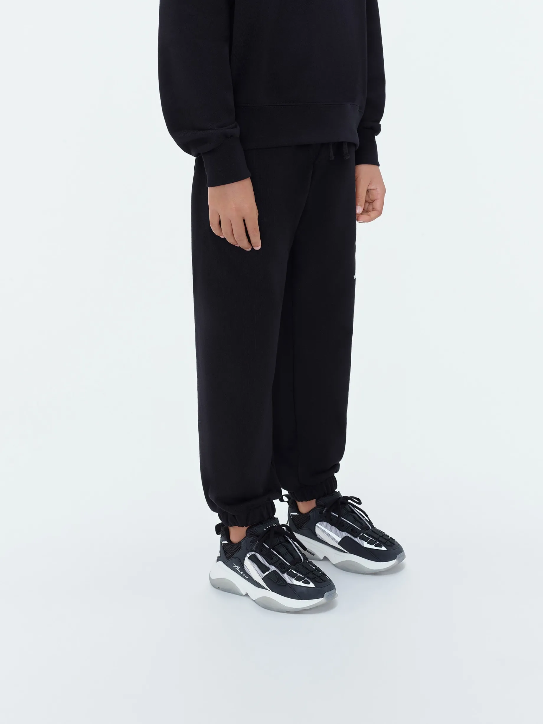 AMIRI STAGGERED SCRIBBLE SWEATPANT
