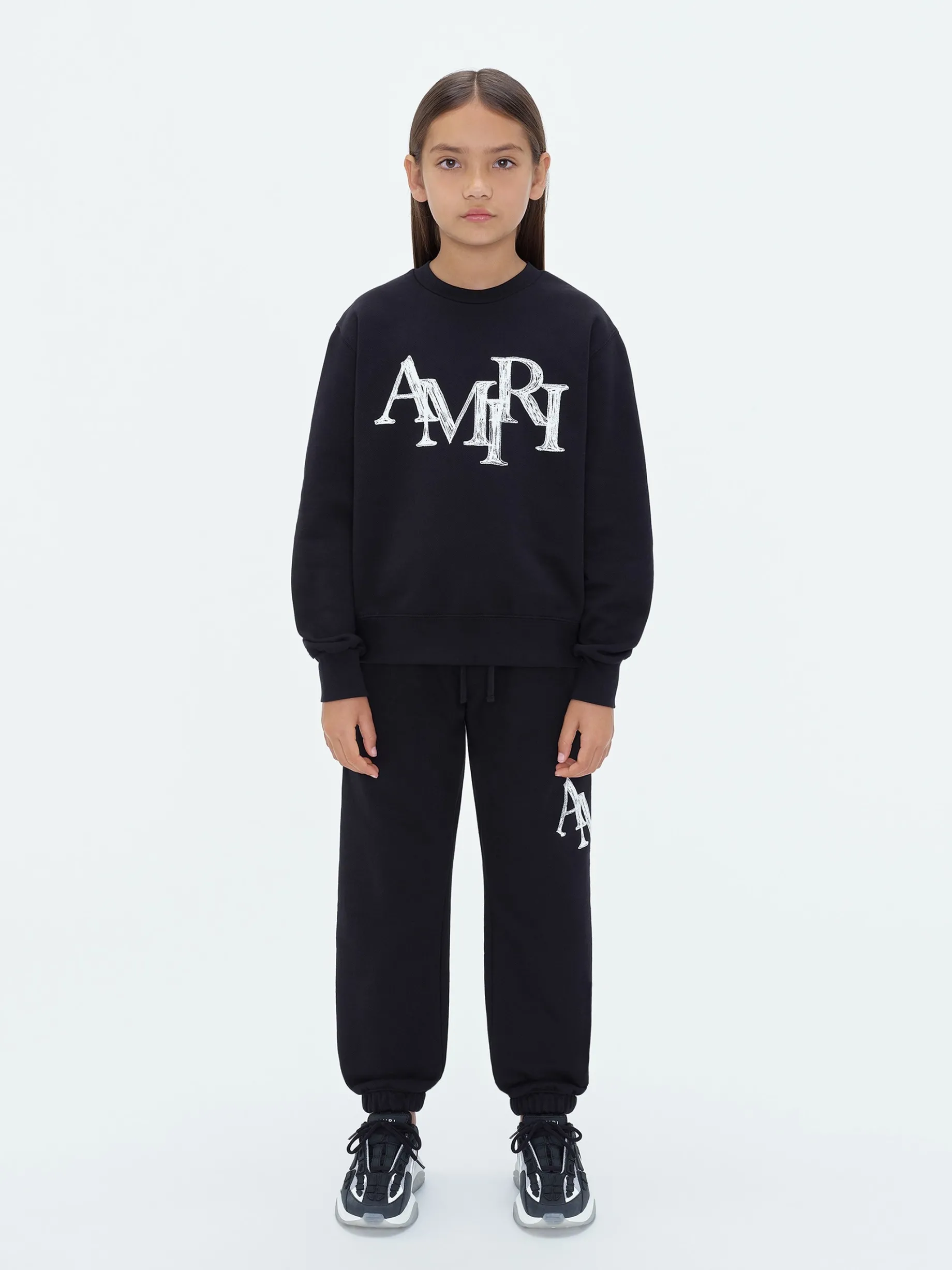 AMIRI STAGGERED SCRIBBLE SWEATPANT