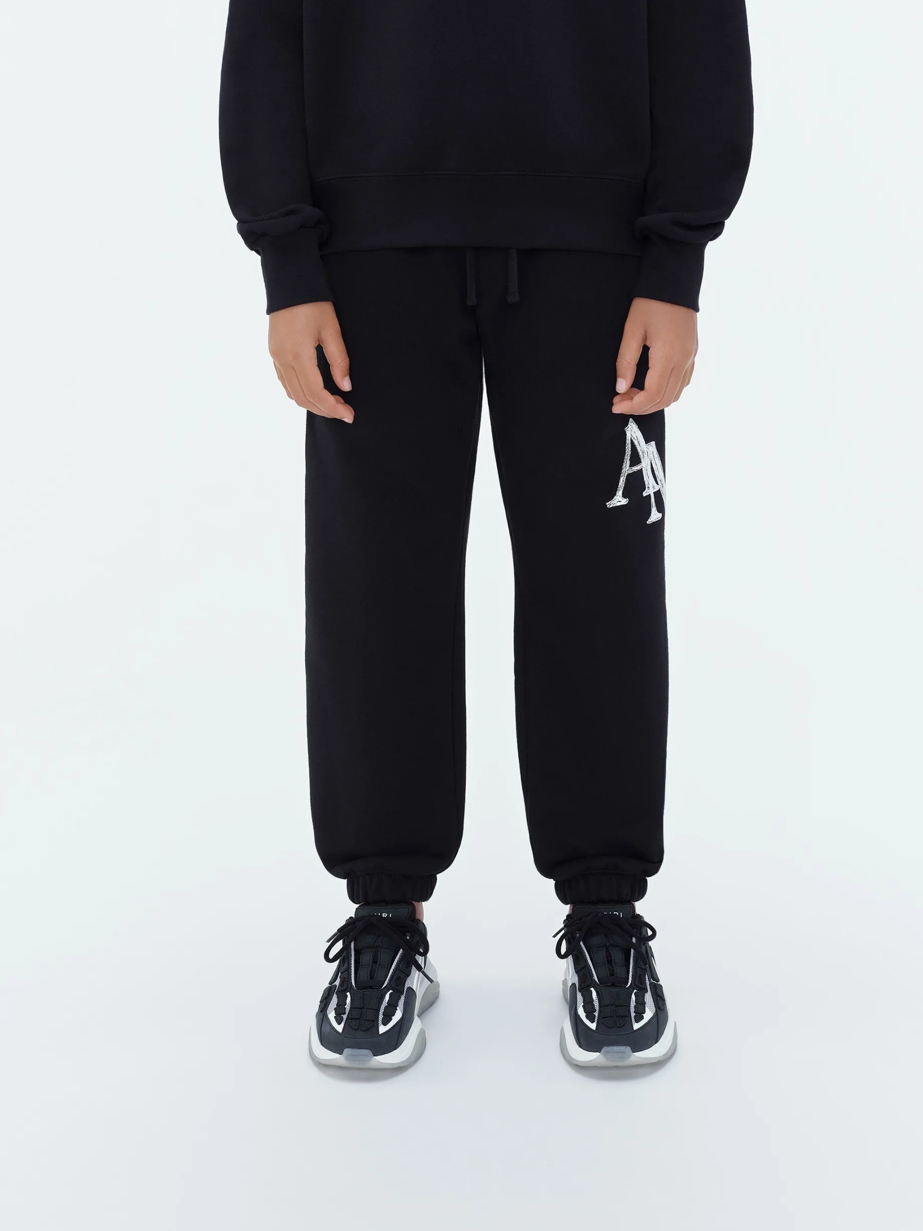 AMIRI STAGGERED SCRIBBLE SWEATPANT