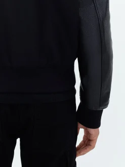 AMIRI STAGGERED VARSITY JACKET