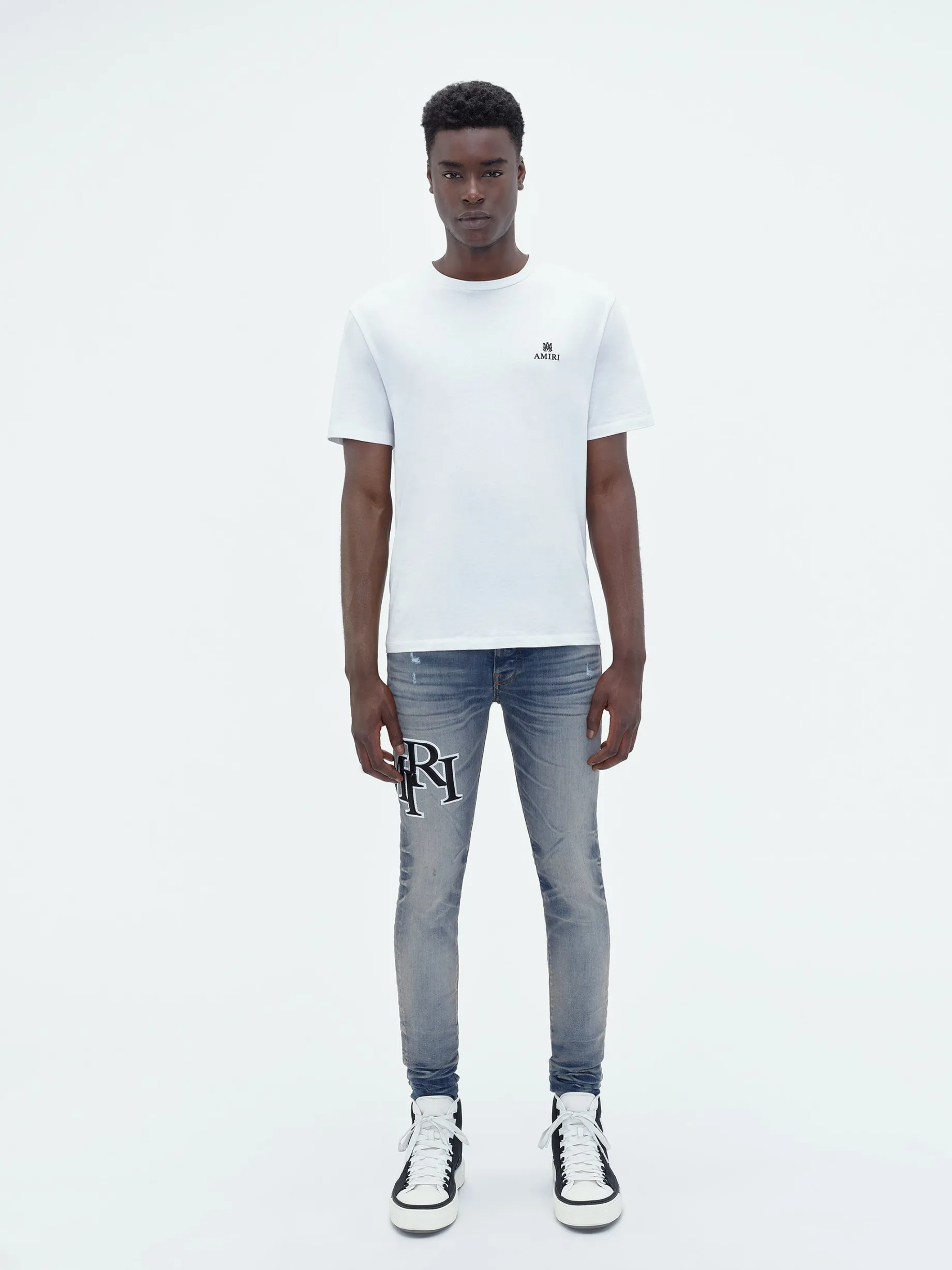 STAGGERED EMBROIDERED LOGO JEAN